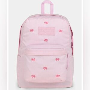 Brand new with tag Jansport superbreak plus backpack in pink with embr bows